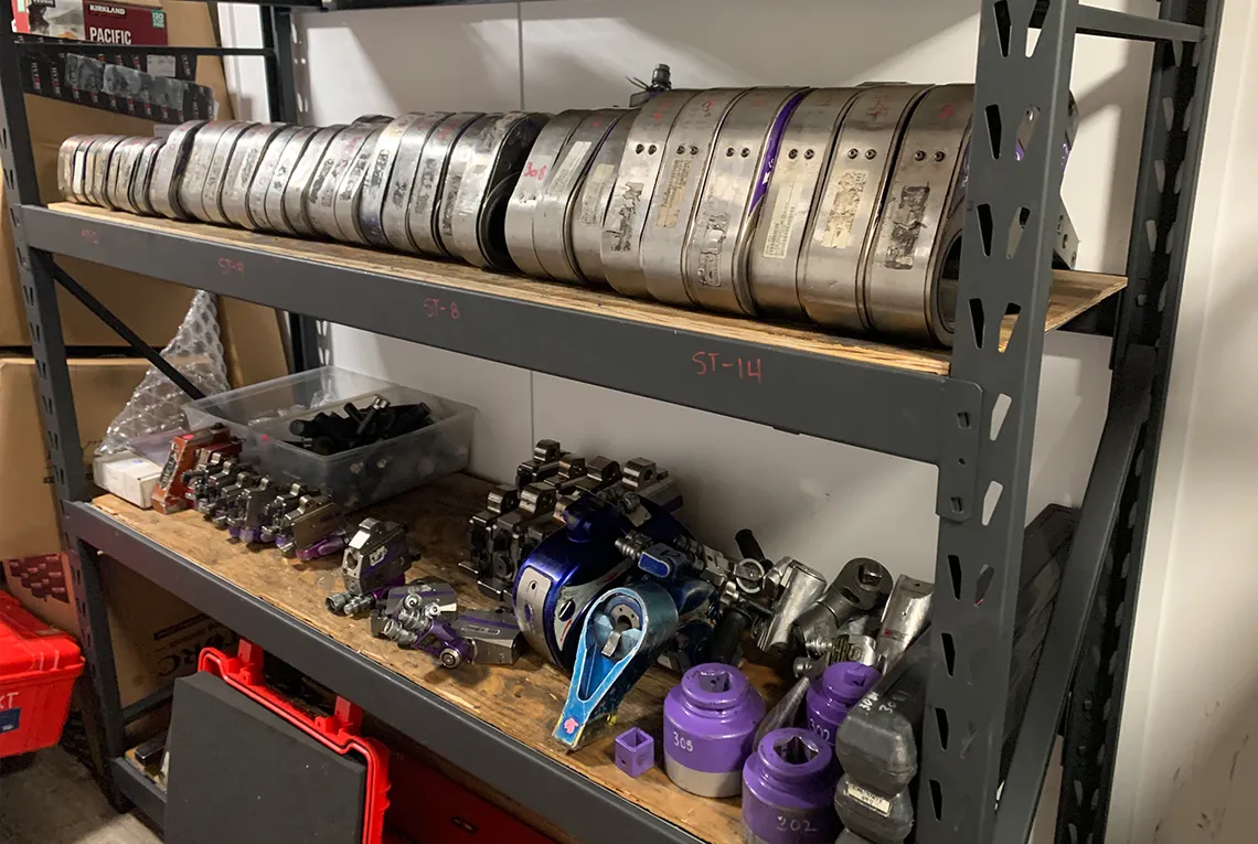 A shelf of various HYTORC tools, links, and accessories used in the completion of the refinery turnaround.