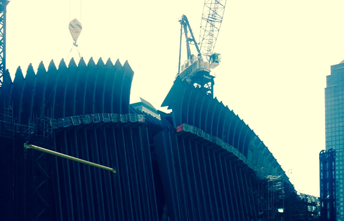 The Oculus Pavilion during initial construction, showing the challenges presented by the intricate steel rib structure.